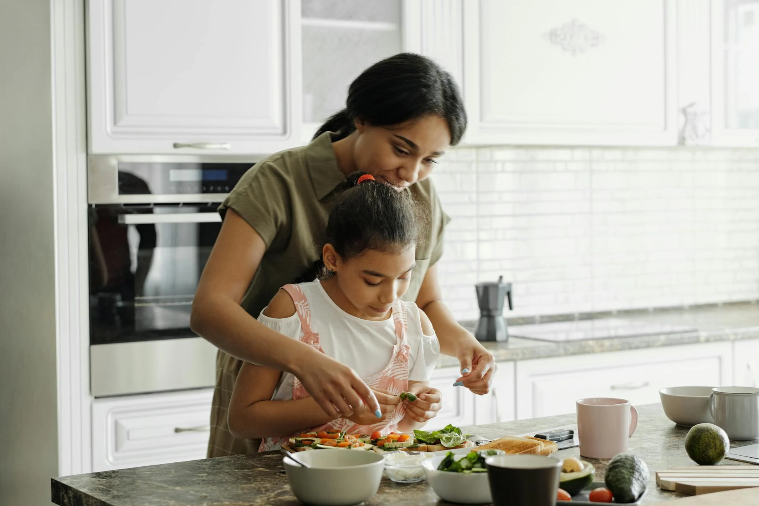 Mum and child cooking