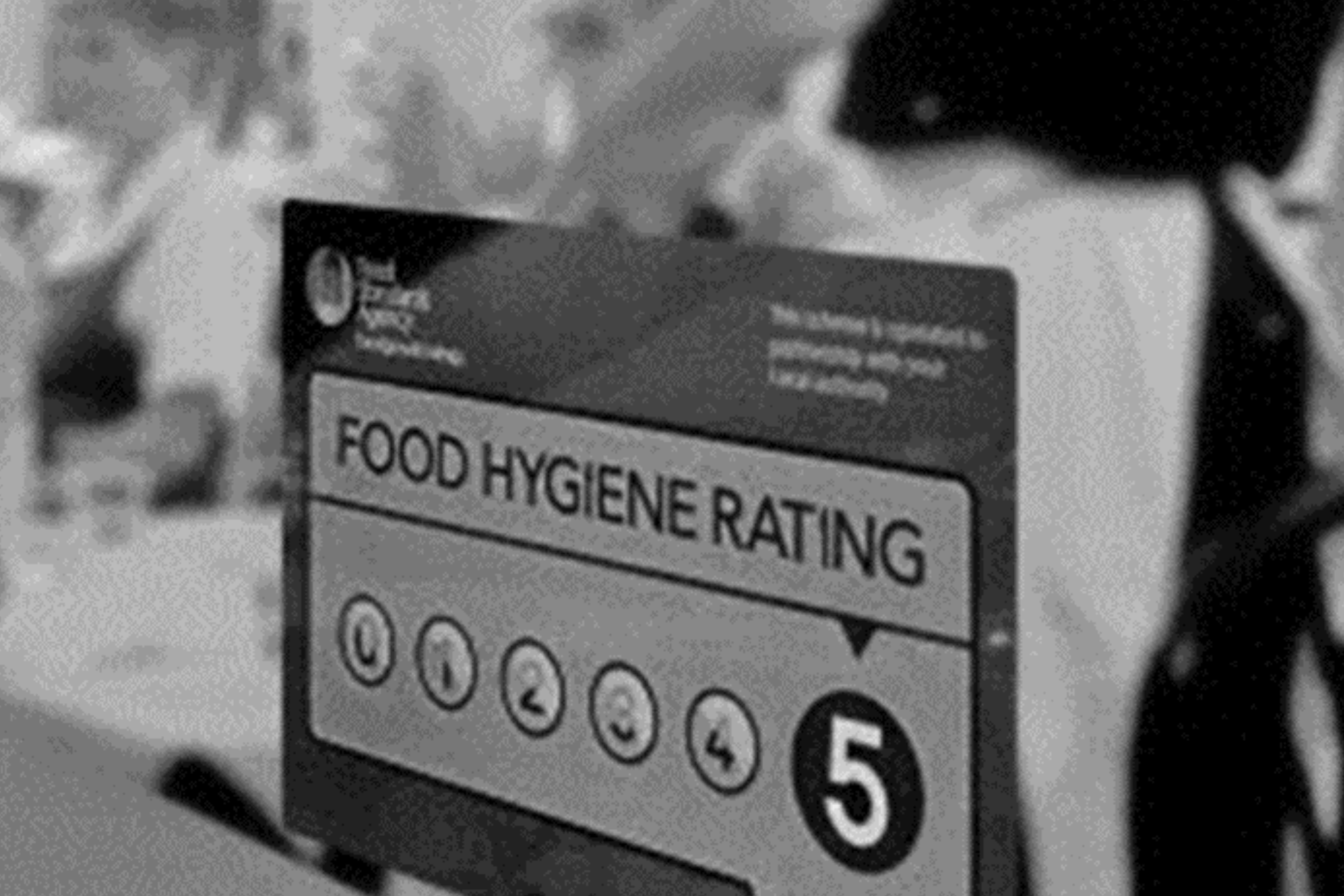 Restaurant door with food standard rating